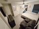 Cozy bedroom featuring neutral walls, carpeting, a ceiling fan, and closet storage space at 3028 Lakes Crest Ave, St Cloud, FL 34772