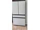 Modern white refrigerator with black trim and glossy finish at 3028 Lakes Crest Ave, St Cloud, FL 34772