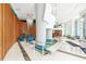 Luxurious lobby with elegant chandelier, water feature, and comfortable seating at 322 E Central Blvd # 614, Orlando, FL 32801