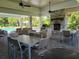 Outdoor clubhouse featuring a stone fireplace and seating offering an inviting space for residents and guests at 3458 Sagebrush St, Harmony, FL 34773