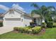 Charming single-story home featuring a well-manicured lawn and a two-car garage at 3458 Sagebrush St, Harmony, FL 34773