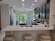 Beautiful kitchen with stainless steel appliances, quartz countertops, and a breakfast bar at 3458 Sagebrush St, Harmony, FL 34773