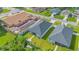 Aerial view of a home with a fenced yard and well-maintained landscaping at 3507 W Jefferson St, Orlando, FL 32805