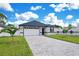 Attractive single-Gathering home boasts a manicured lawn and a neutral gray exterior at 3507 W Jefferson St, Orlando, FL 32805