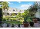 Expansive backyard garden with brick-paved patio, lush garden and calming pool at 386 Lakeview St, Orlando, FL 32804
