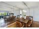 Elegant dining room with sleek table, ample seating, and bright lighting fixture at 386 Lakeview St, Orlando, FL 32804