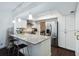 Modern kitchen with white cabinets, granite countertops, and stainless steel appliances at 386 Lakeview St, Orlando, FL 32804
