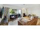 The living room has a comfortable seating area and a fireplace adding warmth and charm to the home at 386 Lakeview St, Orlando, FL 32804