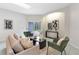 Comfortable living room with a sofa, armchairs, modern decor, and sliding door to a pool area at 4110 Maplegrove Dr, Orlando, FL 32818