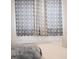 Bedroom with patterned curtains and soft carpet at 4167 Clifden Dr, Ormond Beach, FL 32174