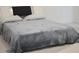 Bedroom featuring carpet floors and a soft gray blanket on the bed at 4167 Clifden Dr, Ormond Beach, FL 32174
