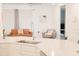 Bright living room featuring a cozy couch, chair, and modern decor at 4167 Clifden Dr, Ormond Beach, FL 32174