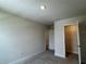 Spacious bedroom with carpet, a bright interior, and a closet with open door, offering plenty of storage at 4170 Sagefield Dr, Harmony, FL 34773