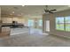 Spacious kitchen features a center island, white cabinetry, and lots of natural light at 4170 Sagefield Dr, Harmony, FL 34773