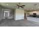 Bright, open-concept living area connects seamlessly to a modern, island kitchen at 4170 Sagefield Dr, Harmony, FL 34773