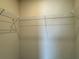 A walk-in closet with metal racks and shelving for optimal storage solutions at 4170 Sagefield Dr, Harmony, FL 34773
