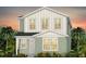 Charming two-story home with eye-catching architectural details and a well-manicured lawn at 5015 Starling Bird Ln, St Cloud, FL 34771