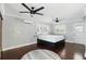 Bright bedroom with dark wood floors, modern ceiling fans, mini-split A/C and light-filled windows at 509 Altaloma Ave, Orlando, FL 32803