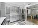 Kitchen features quartz countertops, stainless steel appliances, a breakfast bar and modern gray cabinetry at 509 Altaloma Ave, Orlando, FL 32803