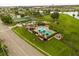 Aerial view of community pool, playground, and recreational facilities at 5324 Barefoot Path, Kissimmee, FL 34746