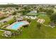 Community amenities include pool, tennis courts, basketball court and playground area at 5324 Barefoot Path, Kissimmee, FL 34746