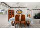 Inviting dining room area with tile floors and bright natural light at 5324 Barefoot Path, Kissimmee, FL 34746