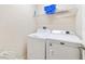Laundry room is equipped with a modern washer and dryer unit for convenience at 540 Vitoria Rd, Davenport, FL 33837