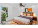 Cozy bedroom with natural light, large closet, and contemporary design elements at 604 Desoto Dr, Casselberry, FL 32707