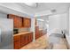 Bright kitchen offering ample cabinet space, granite countertops, and modern appliances for convenient cooking at 604 Desoto Dr, Casselberry, FL 32707