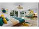 Spacious main bedroom with lake views, mirrored closet and bright, airy feel at 604 Desoto Dr, Casselberry, FL 32707