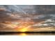 Scenic sunset view over the lake with clouds and reflections of orange and yellow light, Florida at 604 Desoto Dr, Casselberry, FL 32707