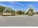 Elegant Glynwood community entrance featuring manicured landscaping and a welcoming brick signage in a serene surrounding at 748 Duff Dr, Winter Garden, FL 34787