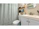 Bathroom featuring a vanity sink and shower with curtain at 7810 Grevillea Dr, Orlando, FL 32822