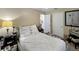 Bedroom with a comfortable bed and ample closet space at 7810 Grevillea Dr, Orlando, FL 32822