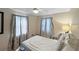 Bright bedroom with carpet and dual windows at 7810 Grevillea Dr, Orlando, FL 32822