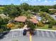 Aerial view of the clubhouse with a pool and parking at 7856 Sugar Bend Dr # 7856, Orlando, FL 32819