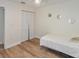 Cozy bedroom with wood floors and closet at 7856 Sugar Bend Dr # 7856, Orlando, FL 32819