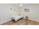 Bright bedroom featuring hardwood floors and natural light at 7856 Sugar Bend Dr # 7856, Orlando, FL 32819