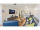 Inviting living room features stylish furnishings and an open layout to the kitchen at 7856 Sugar Bend Dr # 7856, Orlando, FL 32819