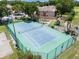 Aerial view of the community tennis court and playground area at 7856 Sugar Bend Dr # 7856, Orlando, FL 32819