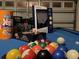 Game room with a variety of games, including pool, card, and paddle games, for entertaining and fun at 8023 King Palm Cir, Kissimmee, FL 34747