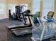 Modern gym with treadmills and strength training equipment, offering convenience for fitness enthusiasts at 8023 King Palm Cir, Kissimmee, FL 34747