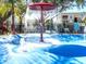 Community splash pad with water features and vibrant colors, perfect for Gathering fun and recreational activities at 8023 King Palm Cir, Kissimmee, FL 34747