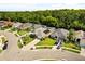 An aerial view of the community highlighting homes with mature landscaping at 8852 Fort Jefferson Blvd, Orlando, FL 32822