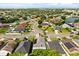 An aerial view of the neighborhood highlighting the mature trees and landscaping at 8852 Fort Jefferson Blvd, Orlando, FL 32822