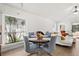 Cozy breakfast nook with a round table, seating for four, and large windows at 8852 Fort Jefferson Blvd, Orlando, FL 32822