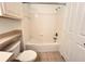 Bathroom with a shower/tub combo and a toilet at 8929 Legacy Ct # 208, Kissimmee, FL 34747