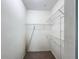 Walk in closet with shelving and carpeted flooring at 8929 Legacy Ct # 208, Kissimmee, FL 34747