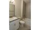 Full bathroom featuring a granite vanity, tiled shower over tub and neutral color palette at 1168 Citrus Landings Blvd, Davenport, FL 33837