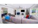Spacious living room with marble floors, modern decor, and a view of the exterior at 1206 Culver Rd, Orlando, FL 32825